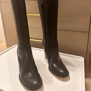 Black knee high boots with 3 1/2” heel. Brand new, never worn.